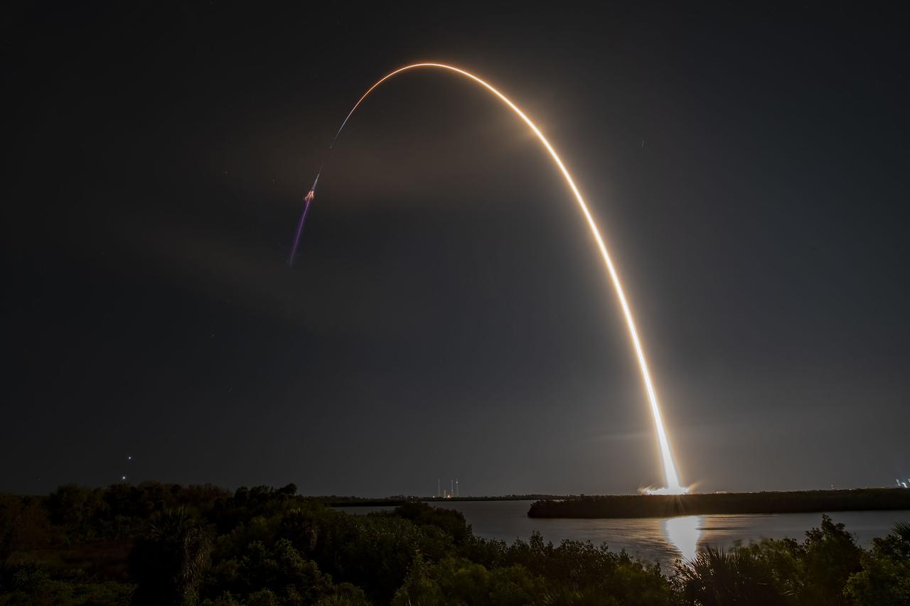 Creating a golden streak in the night sky, a SpaceX Falcon 9 rocket soars upward after liftoff from Launch Complex 39A at NASA’s Kennedy Space Center in Florida on March 14, 2023, on the company’s 27th Commercial Resupply Services mission for the agency to the International Space Station. Liftoff was at 8:30 p.m. EDT. The Dragon spacecraft will deliver more than 6,000 pounds of science and research, supplies, and equipment to the crew aboard the space station, including the final two experiments comprising the National Institutes for Health and International Space Station National Laboratory’s Tissue Chips in Space initiative, Cardinal Heart 2.0 and Engineered Heart Tissues-2. The spacecraft is expected to spend about a month attached to the orbiting outpost before it returns to Earth with research and return cargo, splashing down off the coast of Florida. 
