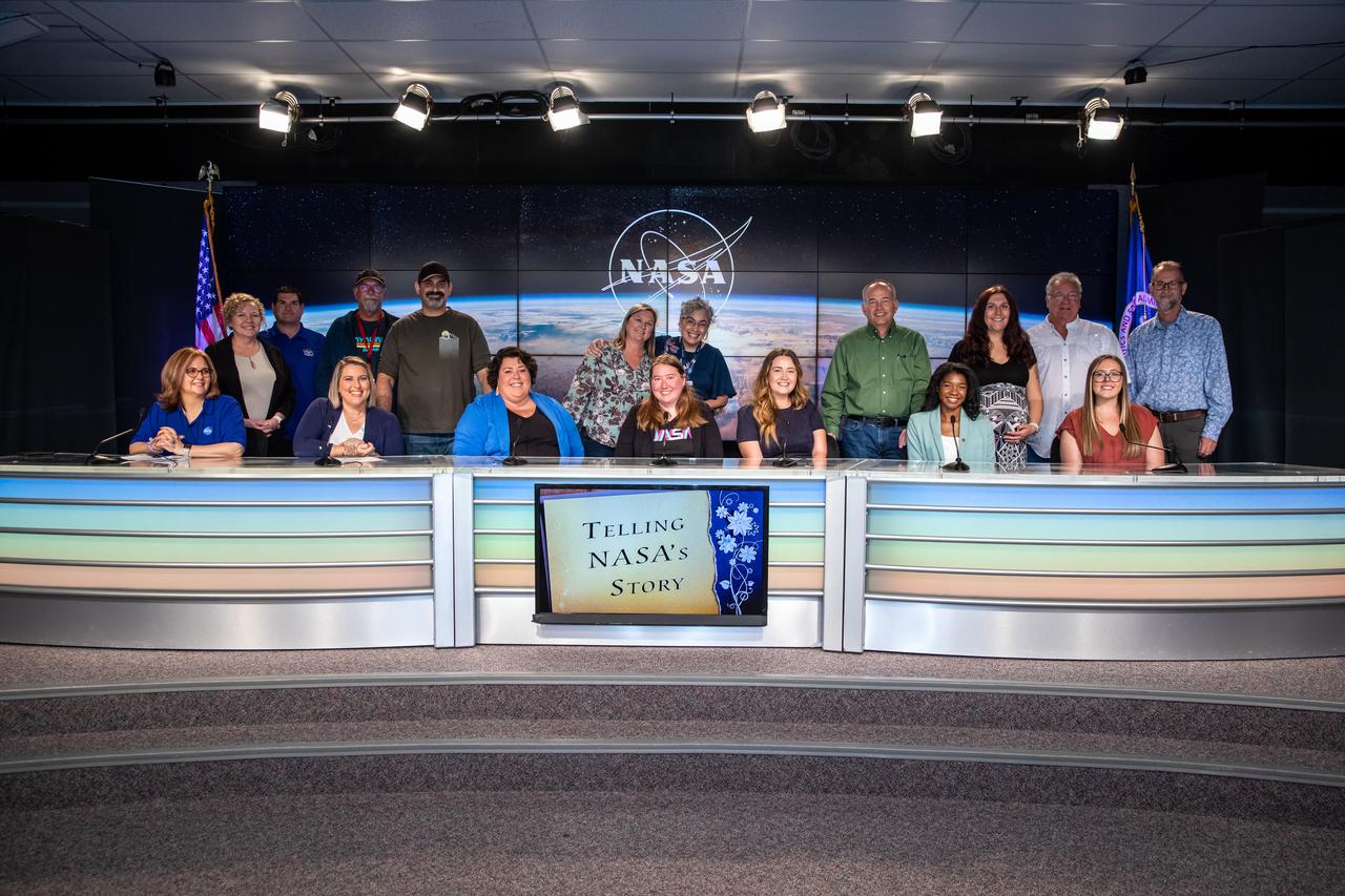 Employees who work at NASA’s Kennedy Space Center Press Site are photographed inside the News Auditorium at the Florida spaceport on March 23, 2023, following a panel discussion held to commemorate Women’s History Month. The event, titled “Celebrating the Women Who Tell Our Stories,” included women who typically work behind the scenes sharing what goes into conceiving, creating, and curating NASA stories. Panelists included Kennedy’s news chief, members of the broadcast team, public affairs specialists, a video producer, and a writer.
