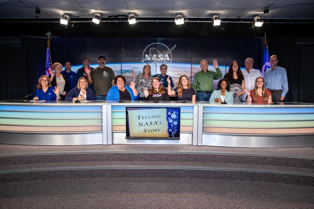 Employees who work at NASA’s Kennedy Space Center Press Site are photographed inside the News Auditorium at the Florida spaceport on March 23, 2023, following a panel discussion held to commemorate Women’s History Month. The event, titled “Celebrating the Women Who Tell Our Stories,” included women who typically work behind the scenes sharing what goes into conceiving, creating, and curating NASA stories. Panelists included Kennedy’s news chief, members of the broadcast team, public affairs specialists, a video producer, and a writer.