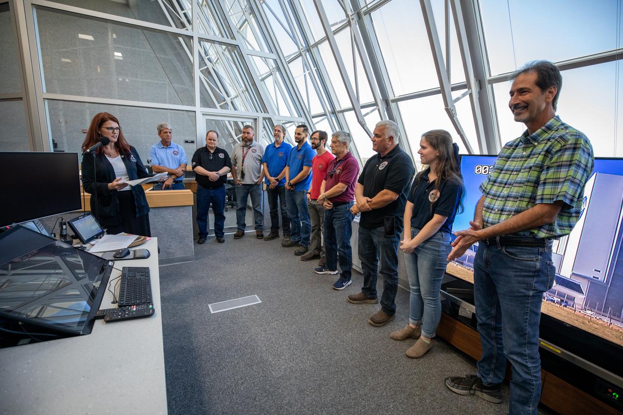Artemis Launch Director Charlie Blackwell-Thompson (left) acknowledged and honored members of the Artemis team during the inaugural Artemis Launch Director Awards, held March 24, 2023, inside Firing Room 1 of the Rocco A. Petrone Launch Control Center at NASA’s Kennedy Space Center in Florida. Award recipients included members of the crawler transporter team, which using Crawler-Transporter 2, carried the agency’s mobile launcher with the Space Launch System rocket and Orion spacecraft 4.2 miles from the Vehicle Assembly Building to Launch Pad 39B for the launch of Artemis I. The first in a series of increasingly complex missions, Artemis I launched successfully at 1:47 a.m. EST on Nov. 16, 2022.