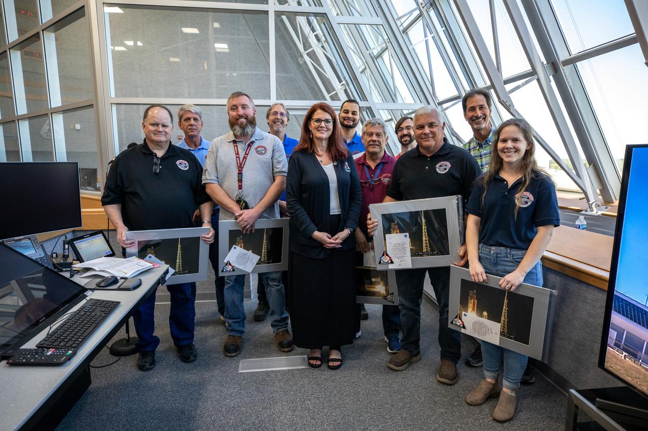 Artemis Launch Director Charlie Blackwell-Thompson (center) acknowledged and honored members of the Artemis team during the inaugural Artemis Launch Director Awards, held March 24, 2023, inside Firing Room 1 of the Rocco A. Petrone Launch Control Center at NASA’s Kennedy Space Center in Florida. Award recipients included members of the crawler transporter team, which using Crawler-Transporter 2, carried the agency’s mobile launcher with the Space Launch System rocket and Orion spacecraft 4.2 miles from the Vehicle Assembly Building to Launch Pad 39B for the launch of Artemis I. The first in a series of increasingly complex missions, Artemis I launched successfully at 1:47 a.m. EST on Nov. 16, 2022.