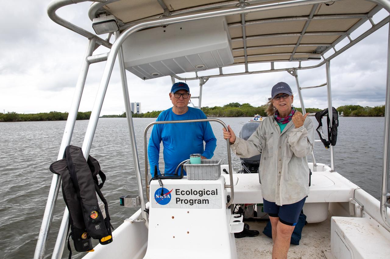 Kennedy Space Center’s Doug Scheidt (left), an ecologist working on NASA’s Environmental and Medical Contract (NEMCON), and Jane Provancha, manager of the ecological group for NEMCON, oversee seagrass restoration efforts at the Florida spaceport on March 29, 2023. Kennedy’s Environmental Management Branch is working to plant a minimum of 28,000 shoots of seagrass divided into 18 sites across three areas at the Florida spaceport as part of a pilot project for seagrass restoration efforts. The project will look at the feasibility of replanting seagrass in Kennedy waters and, if successful, could lead to the spaceport becoming a donor site where shoots of grass can be broken off and relocated to other areas within Kennedy or along the Indian River Lagoon to promote growth.
