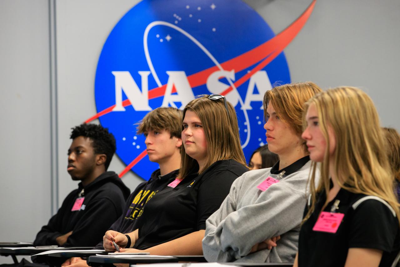 As part of NASA’s NextGen STEM project, students from Florida’s Montverde Academy, Storm Grove Middle School, and Whispering Pines School, as well as a homeschool collective from Georgia, participate in an environmentally focused Earth Day briefing inside the News Auditorium at NASA’s Kennedy Space Center in Florida on April 20, 2023. Along with the students participating in person, middle- and high-school students across the country had the opportunity to ask questions of the panel via phone to discuss how technology and science coexist with nature at Kennedy.