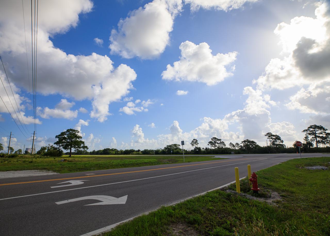 A view of the entrance to SpaceX’s Roberts Road off of State Road 3 at NASA’s Kennedy Space Center in Florida on April 21, 2023. The company wishes to extend the road to allow for expansion of its current facilities. An environmental impact study is underway to investigate the feasibility of the campus expansion. 