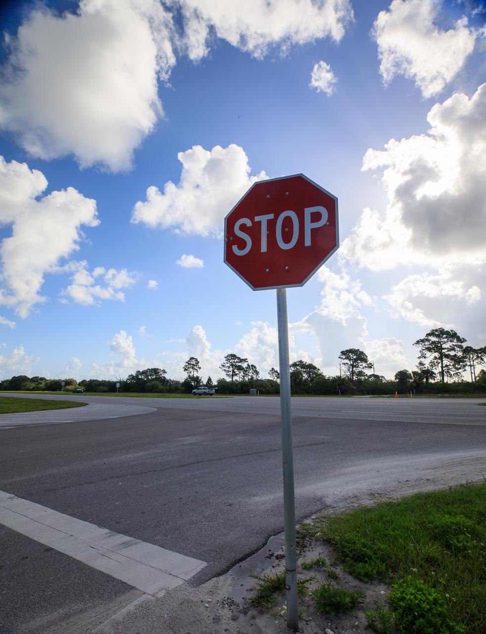 A view of the entrance to SpaceX’s Roberts Road off of State Road 3 at NASA’s Kennedy Space Center in Florida on April 21, 2023. The company wishes to extend the road to allow for expansion of its current facilities. An environmental impact study is underway to investigate the feasibility of the campus expansion. 