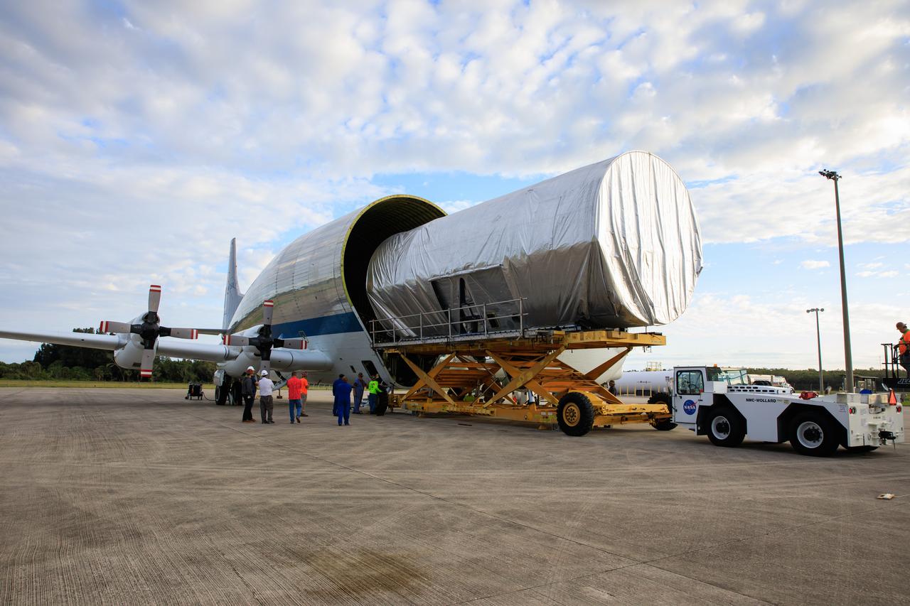 The Multi-Purpose Logistics Module (MPLM), used during the Space Shuttle Program to transfer cargo to and from the International Space Station, is loaded into NASA's Super Guppy aircraft at the Launch and Landing Facility runway at Kennedy Space Center in Florida on April 25, 2023. The MPLM will be transported to Ellington Field in Houston, where it will then be transported by road to Axiom’s facility near Ellington to be utilized to further commercialization of space. Three MPLMs were built by Thales Alenia Space Italia (TASI) for the Italian Space Agency (ASI) and named after Italian masters (Leonardo, Raffaello, and Donatello). Only two ever flew to the space station, Leonardo and Raffaello, with Axiom intending to use the Raffaello module as a future element that will attach to a segment being built by the company for addition to the station. 