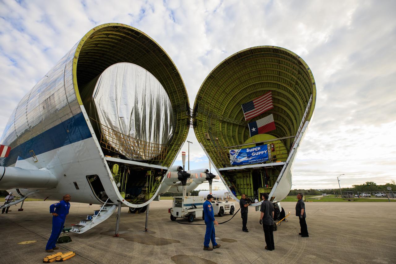 The Multi-Purpose Logistics Module (MPLM), used during the Space Shuttle Program to transfer cargo to and from the International Space Station, is loaded into NASA's Super Guppy aircraft at the Launch and Landing Facility runway at Kennedy Space Center in Florida on April 25, 2023. The MPLM will be transported to Ellington Field in Houston, where it will then be transported by road to Axiom’s facility near Ellington to be utilized to further commercialization of space. Three MPLMs were built by Thales Alenia Space Italia (TASI) for the Italian Space Agency (ASI) and named after Italian masters (Leonardo, Raffaello, and Donatello). Only two ever flew to the space station, Leonardo and Raffaello, with Axiom intending to use the Raffaello module as a future element that will attach to a segment being built by the company for addition to the station. 