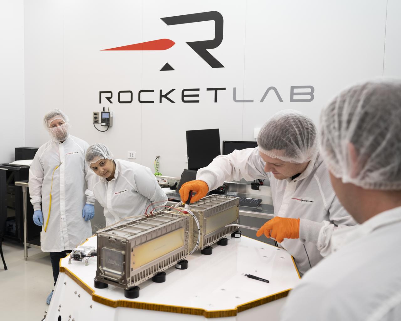Technicians prepare NASA’s Time-Resolved Observations of Precipitation structure and storm Intensity with a Constellation of Smallsats (TROPICS) CubeSats for encapsulation in Rocket Lab’s Electron payload fairing in a processing facility near Launch Complex 1 in Mahia, New Zealand. TROPICS is scheduled to launch on Monday, May 1, at 1 a.m. New Zealand time from Launch Complex 1, Pad B. TROPICS will provide data on temperature, precipitation, water vapor, and clouds by measuring microwave frequencies, providing insight into storm formation and intensification. 