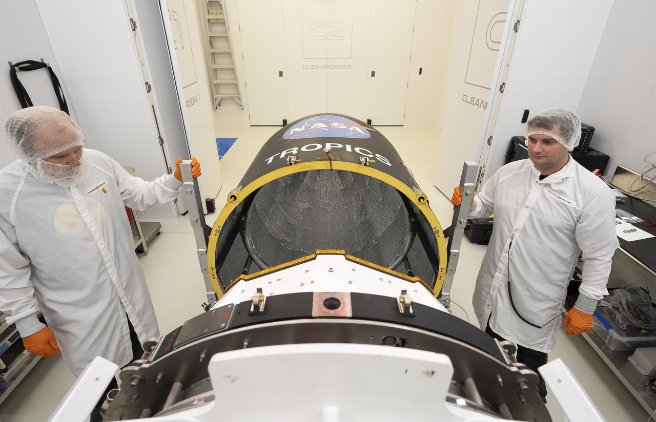 Technicians place NASA’s Time-Resolved Observations of Precipitation structure and storm Intensity with a Constellation of Smallsats (TROPICS) CubeSats in Rocket Lab’s Electron payload fairing in a processing facility near Launch Complex 1 in Mahia, New Zealand. TROPICS is scheduled to launch on Monday, May 1, at 1 a.m. New Zealand time from Launch Complex 1, Pad B. TROPICS will provide data on temperature, precipitation, water vapor, and clouds by measuring microwave frequencies, providing insight into storm formation and intensification. 