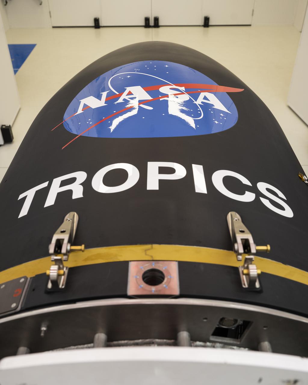 Rocket Lab’s Electron payload fairing is in view inside a processing facility near Launch Complex 1 in Mahia, New Zealand. NASA’s Time-Resolved Observations of Precipitation structure and storm Intensity with a Constellation of Smallsats (TROPICS) CubeSats have been encapsulated inside the payload fairing. TROPICS is scheduled to launch on Monday, May 1, at 1 a.m. New Zealand time from Launch Complex 1, Pad B. TROPICS will provide data on temperature, precipitation, water vapor, and clouds by measuring microwave frequencies, providing insight into storm formation and intensification.