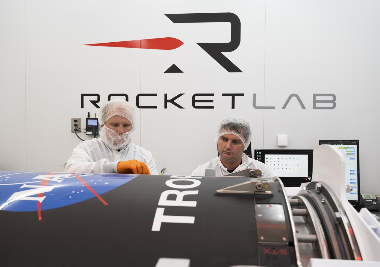 Technicians check Rocket Lab’s Electron payload fairing inside a processing facility near Launch Complex 1 in Mahia, New Zealand. NASA’s Time-Resolved Observations of Precipitation structure and storm Intensity with a Constellation of Smallsats (TROPICS) CubeSats have been encapsulated inside the payload fairing. TROPICS is scheduled to launch on Monday, May 1, at 1 a.m. New Zealand time from Launch Complex 1, Pad B. TROPICS will provide data on temperature, precipitation, water vapor, and clouds by measuring microwave frequencies, providing insight into storm formation and intensification. 