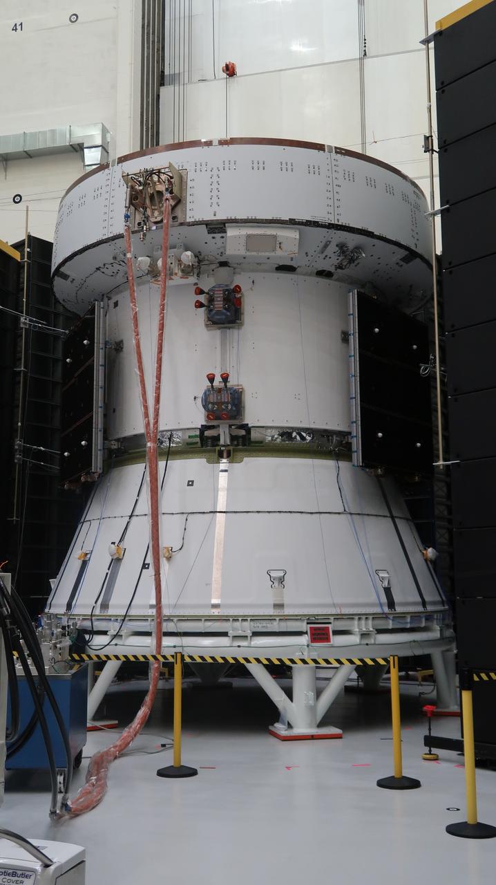 The European Service Module for the Artemis II mission is photographed inside the Neil Armstrong Operations and Checkout Building at NASA's Kennedy Space Center in Florida earlier this month. The Service Module successfully completed a round of acoustic tests to ensure it can withstand the speed and vibration it will experience during launch and throughout the mission. Artemis II will be the first crewed flight test of the Space Launch System rocket and Orion spacecraft. The service module will provide the power necessary to propel Orion on a trip around the Moon, including the in-space maneuvering capability and other commodities necessary to sustain crew for the duration of the mission.