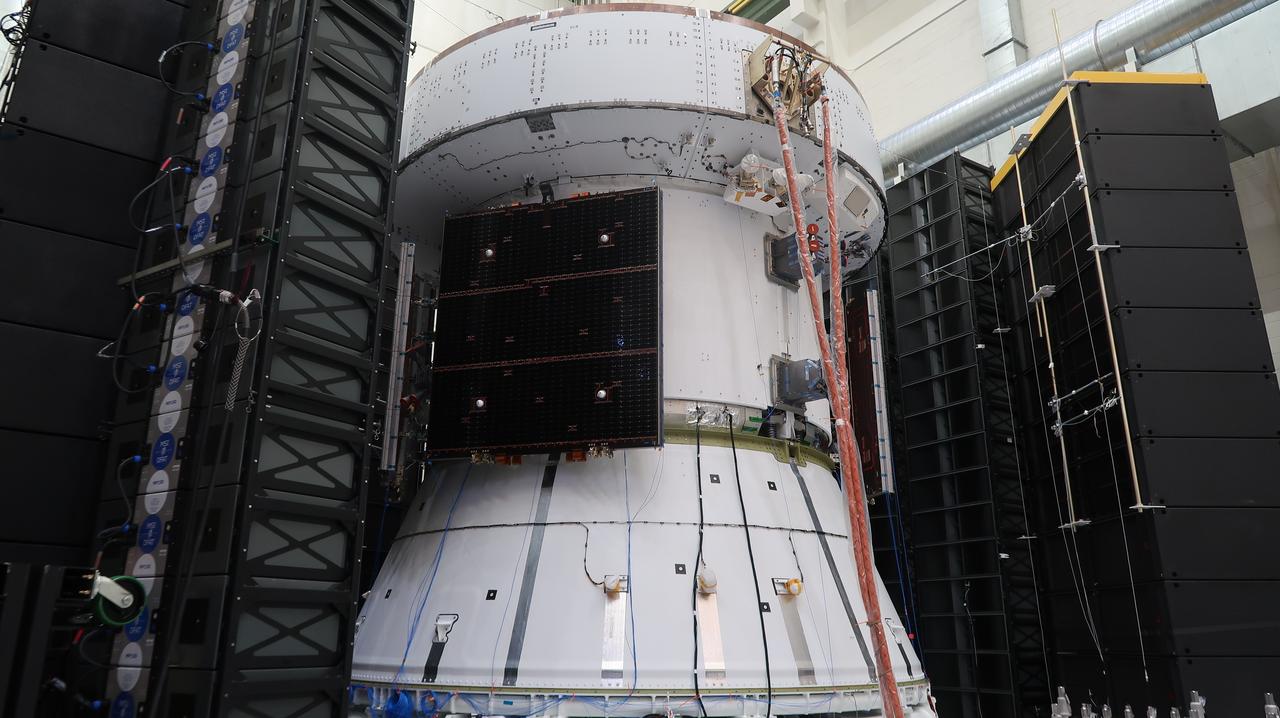 The European Service Module for the Artemis II mission is photographed inside the Neil Armstrong Operations and Checkout Building at NASA's Kennedy Space Center in Florida earlier this month. The Service Module successfully completed a round of acoustic tests to ensure it can withstand the speed and vibration it will experience during launch and throughout the mission. Artemis II will be the first crewed flight test of the Space Launch System rocket and Orion spacecraft. The service module will provide the power necessary to propel Orion on a trip around the Moon, including the in-space maneuvering capability and other commodities necessary to sustain crew for the duration of the mission.