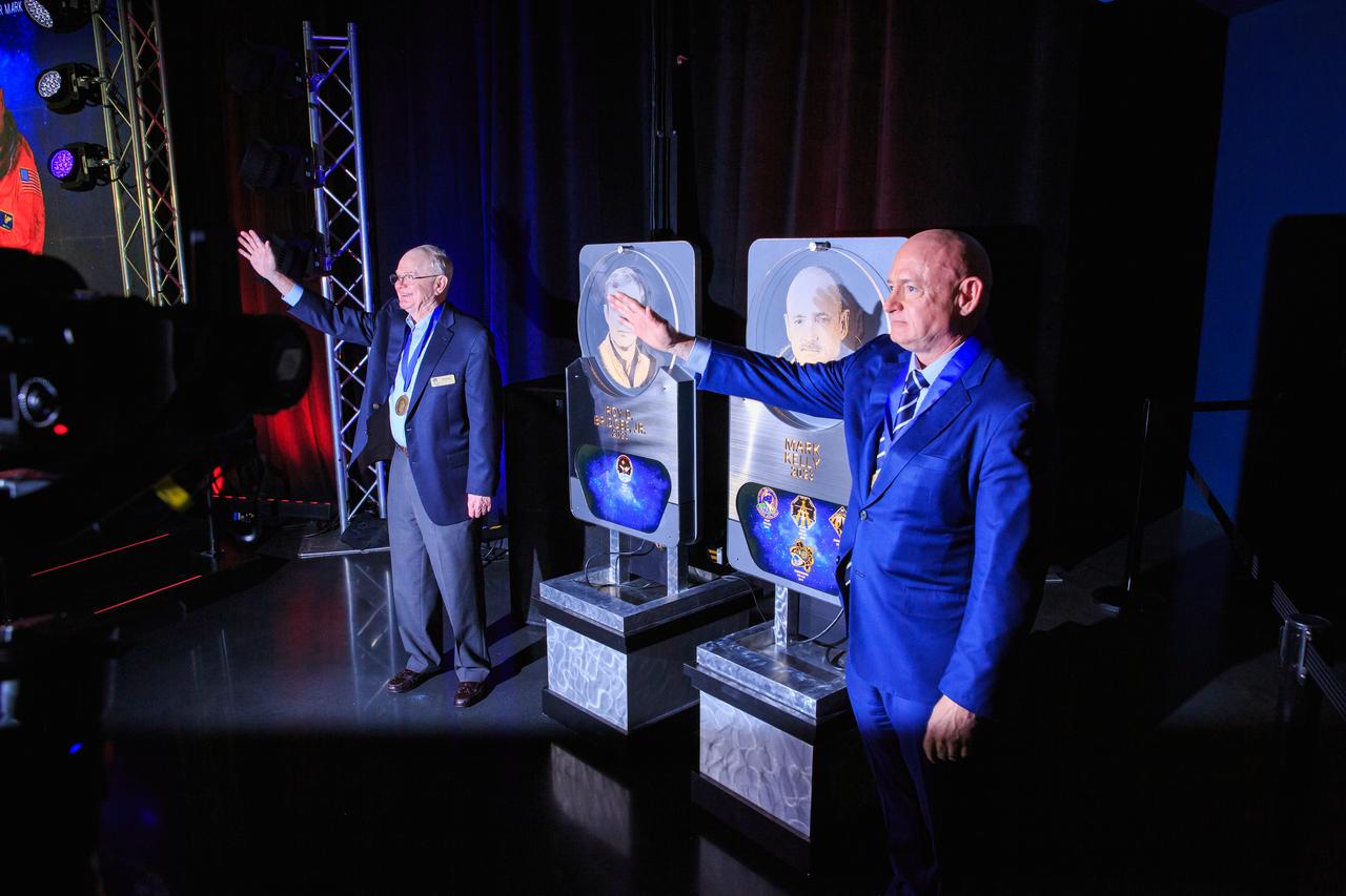 Inside the Space Shuttle Atlantis attraction at NASA’s Kennedy Space Center Visitor Complex in Florida, two space explorers, from left, Roy D. Bridges Jr. and Mark Kelly, are inducted into the U.S. Astronaut Hall of Fame Class of 2023. Inductees into the Hall of Fame are selected by a committee of Hall of Fame astronauts, former NASA officials, flight directors, historians and journalists. The process is administered by the Astronaut Scholarship Foundation. To be eligible, an astronaut must have made his or her first flight at least 17 years before the induction. Candidates must be a U.S. citizen and a NASA-trained commander, pilot, or mission specialist who has orbited the earth at least once. Including Bridges and Kelly, 107 astronauts have been inducted into the AHOF.