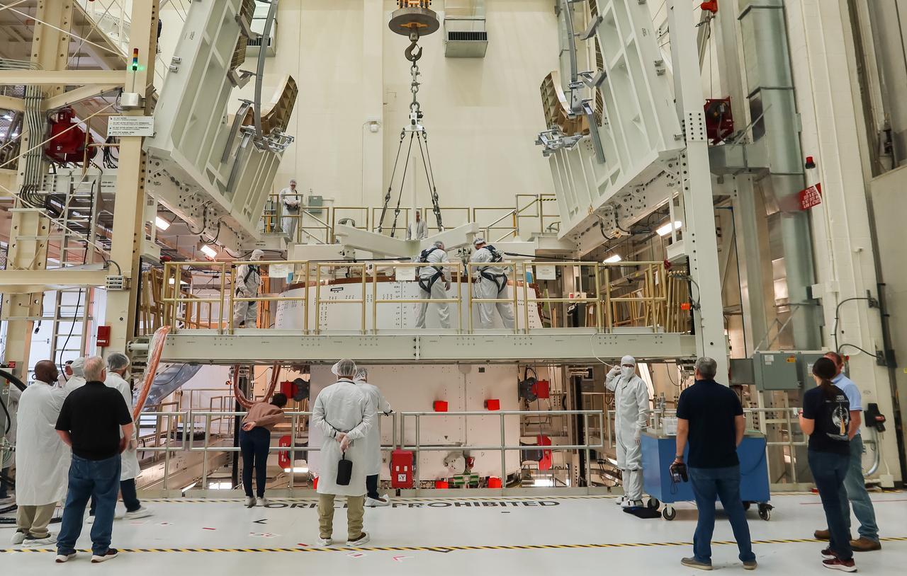 The European Service Module (ESM) for NASA’s Artemis II mission is secured inside the FAST (final assembly and system testing) cell in the high bay of the Neil A. Armstrong Operations and Checkout Building at NASA’s Kennedy Space Center in Florida on May 22, 2023. The ESM is in the FAST cell for final checkouts before it is stacked with the Orion crew module. Technicians are removing the crane that was used to move the ESM. The powerhouse that will fuel and propel Orion in space, the ESM will be used for Artemis II, the first Artemis mission flying crew aboard Orion. 