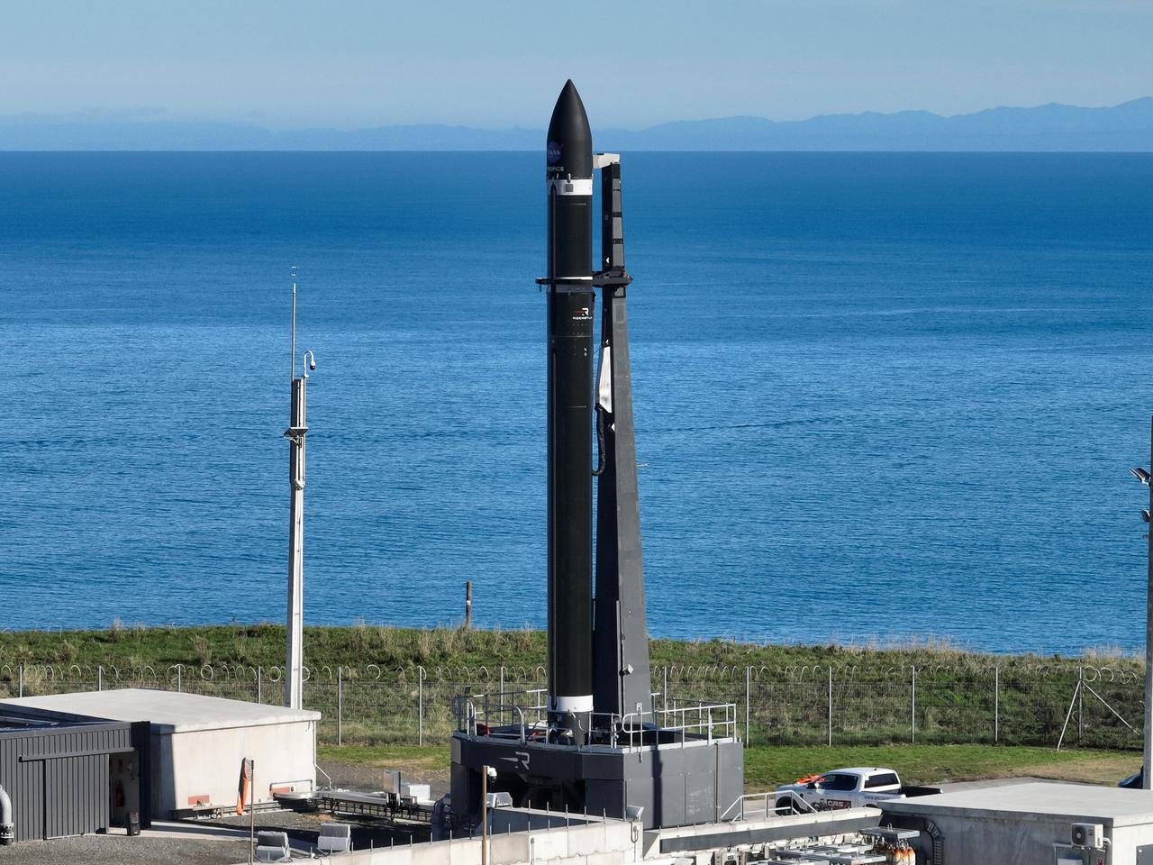 A Rocket Lab Electron rocket stands on Pad B, Launch Complex 1, in Māhia, New Zealand, just ahead of liftoff at 3:46 p.m. NZST Friday, May 26, with NASA’s Time-Resolved Observations of Precipitation structure and storm Intensity with a Constellation of Smallsats (TROPICS) CubeSats secured in the payload fairing atop the rocket. The successful launch placed the final pair of TROPICS CubeSats into orbit, completing the constellation. TROPICS will provide data on temperature, precipitation, water vapor, and clouds by measuring microwave frequencies, providing insight into storm formation and intensification.