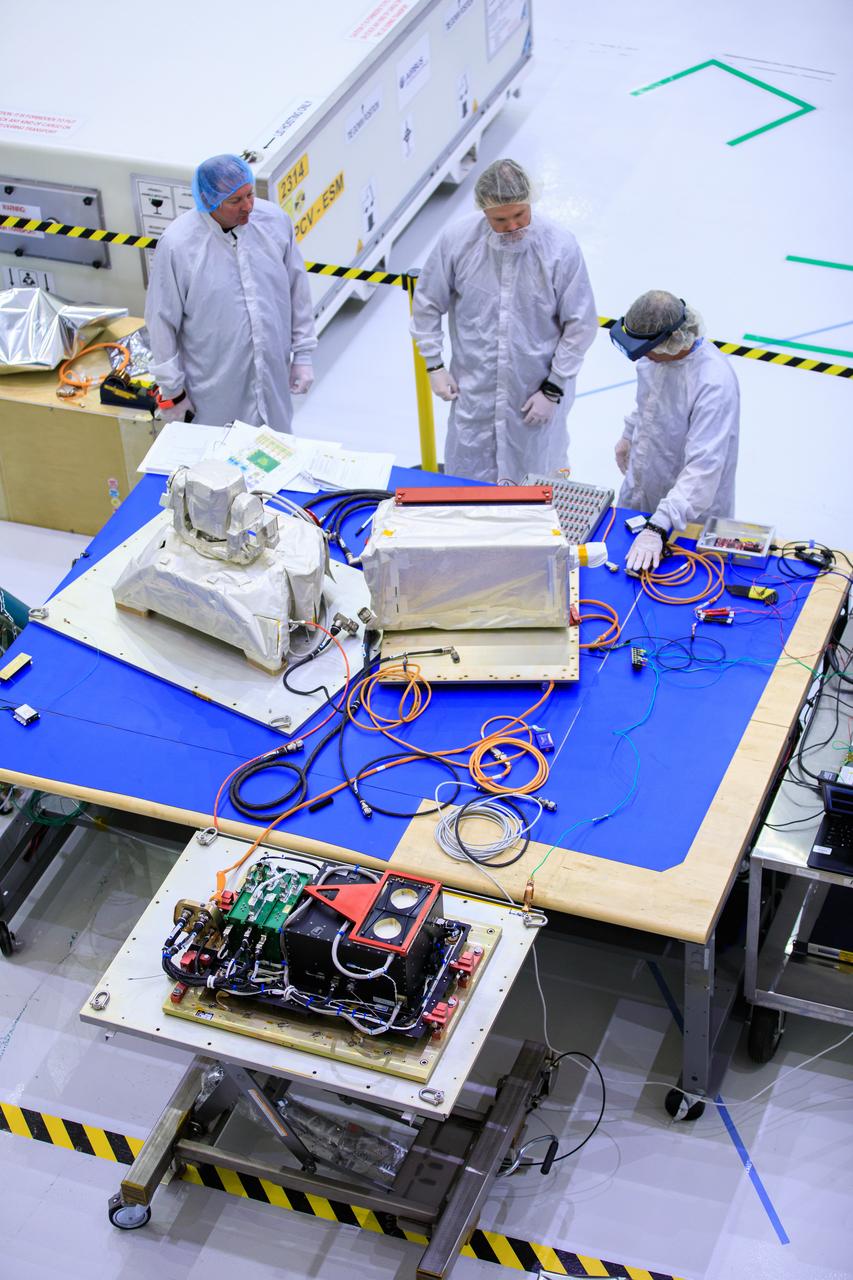 Inside the high bay of the Neil Armstrong Operations and Checkout Building at NASA’s Kennedy Space Center in Florida, technicians assemble on the Optical Communications System for the Artemis II mission on June 2, 2023. Optical communications is the latest space communications technology that is able to provide data rates as much as a hundred times higher than current systems. This will allow astronauts to send and receive ultra-high-definition video from the surface of the Moon or other planets such as Mars. Artemis II will be the first Artemis mission flying crew aboard Orion. 