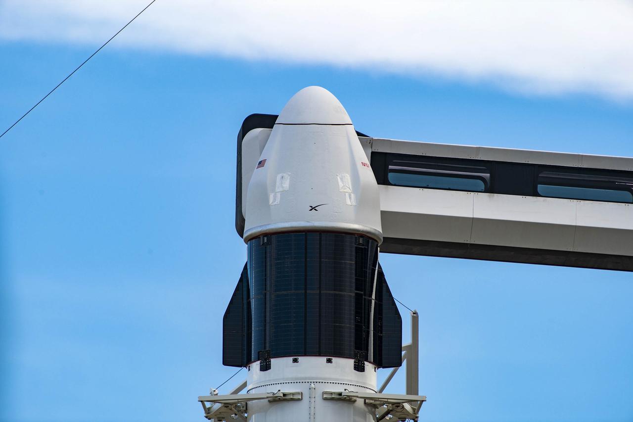 A close-up view of the SpaceX Dragon spacecraft atop the Falcon 9 rocket on the pad at Launch Complex 39A at NASA’s Kennedy Space Center in Florida on June 2, 2023. SpaceX is scheduled to launch its 28th commercial resupply services mission to the International Space Station for NASA. Launch is scheduled for June 3 at 12:35 p.m. EDT. Dragon will deliver approximately 7,000 pounds of crew supplies, equipment, and science experiments to the orbiting laboratory. The spacecraft is expected to spend about a month attached to the orbiting outpost before it returns to Earth with research and return cargo, splashing down off the coast of Florida.