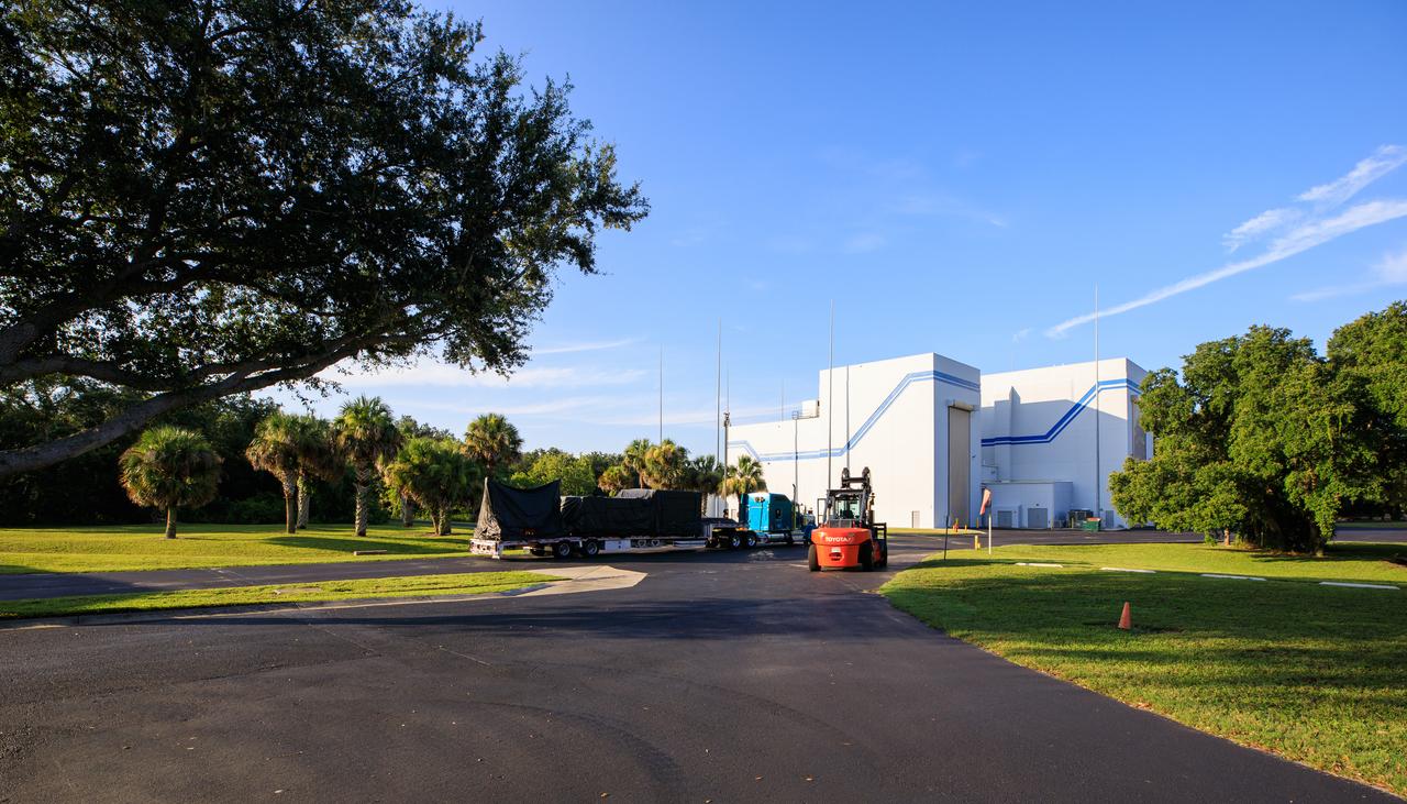 A NASA team prepares to unload twin solar arrays for the agency’s Psyche spacecraft at the Astrotech Space Operations Facility near the agency’s Kennedy Space Center in Florida on July 15, 2023. The solar arrays were shipped from Maxar Technologies, in San Jose, California. They are part of the solar electric propulsion system, provided by Maxar, that will power the spacecraft on its journey to explore a metal-rich asteroid. Psyche will launch atop a SpaceX Falcon Heavy rocket from Launch Complex 39A at Kennedy. Launch is targeted for Oct. 5, 2023. Riding with Psyche is a pioneering technology demonstration, NASA’s Deep Space Optical Communications (DSOC) experiment. 