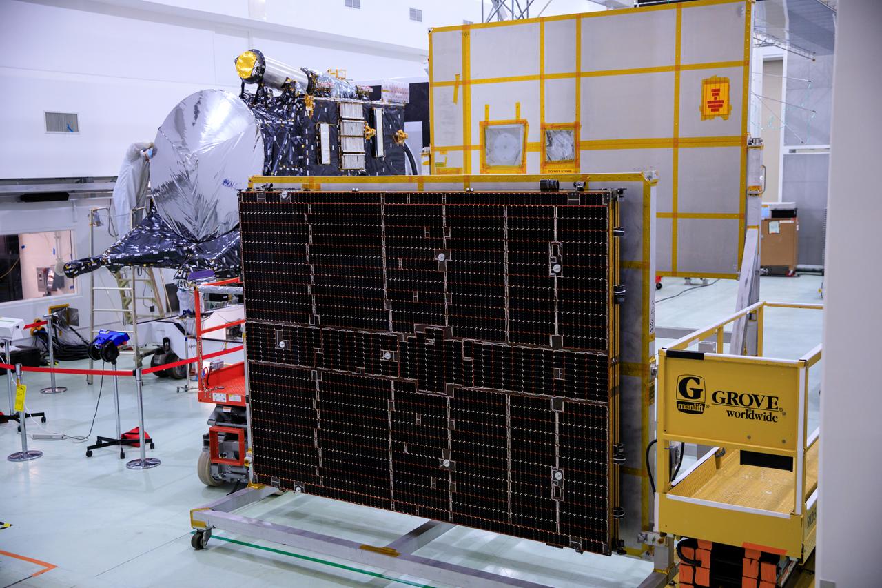 Solar arrays for the agency’s Psyche spacecraft is attached to a stand inside the Astrotech Space Operations Facility near the agency’s Kennedy Space Center in Florida on July 18, 2023. The solar arrays were shipped from Maxar Technologies, in San, Jose, California. They are part of the solar electric propulsion system, provided by Maxar, that will power the spacecraft on its journey to explore a metal-rich asteroid. Psyche will launch atop a SpaceX Falcon Heavy rocket from Launch Complex 39A at Kennedy. Launch is targeted for Oct. 5, 2023. Riding with Psyche is a pioneering technology demonstration, NASA’s Deep Space Optical Communications (DSOC) experiment.