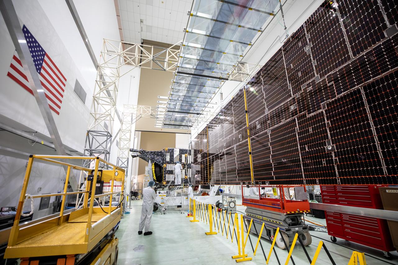 The first of two solar arrays for NASA’s Psyche spacecraft has been extended inside the Astrotech Space Operations Facility near the agency’s Kennedy Space Center in Florida on July 20, 2023. Technicians are preparing to integrate the solar arrays to the Psyche spacecraft. The solar arrays were shipped from Maxar Technologies, in San Jose, California. They are part of the solar electric propulsion system, provided by Maxar, that will power the spacecraft on its journey to explore a metal-rich asteroid. Psyche will launch atop a SpaceX Falcon Heavy rocket from Launch Complex 39A at Kennedy. Launch is targeted for Oct. 5, 2023. Riding with Psyche is a pioneering technology demonstration, NASA’s Deep Space Optical Communications (DSOC) experiment. 