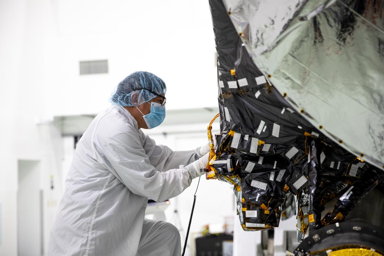 A NASA team member prepares the agency’s Psyche spacecraft for integration with its twin solar arrays inside the Astrotech Space Operations Facility near the agency’s Kennedy Space Center in Florida on July 20, 2023. The solar arrays were shipped from Maxar Technologies, in San Jose, California. They are part of the solar electric propulsion system, provided by Maxar, that will power the spacecraft on its journey to explore a metal-rich asteroid. Psyche will launch atop a SpaceX Falcon Heavy rocket from Launch Complex 39A at Kennedy. Launch is targeted for Oct. 5, 2023. Riding with Psyche is a pioneering technology demonstration, NASA’s Deep Space Optical Communications (DSOC) experiment. 