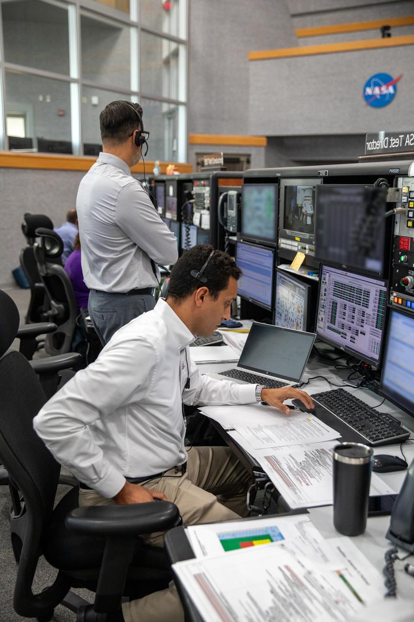 Artemis launch team members are on console inside Firing Room 1 at the Launch Control Center at NASA’s Kennedy Space Center in Florida for the first Artemis II launch simulation on July 20, 2023. Sitting in the foreground is NASA Test Director Sharif Abdel-Magid. Standing in the background is Carlos Monge, branch chief for Test, Launch, and Recovery Operations. A team of engineers with Exploration Ground Systems and Jacobs, are rehearsing the steps to launch NASA’s Space Launch System and Orion spacecraft for the Artemis II crewed mission. Artemis II will be the first mission with astronauts under Artemis that will test and check out all of Orion’s systems needed for future crewed missions.