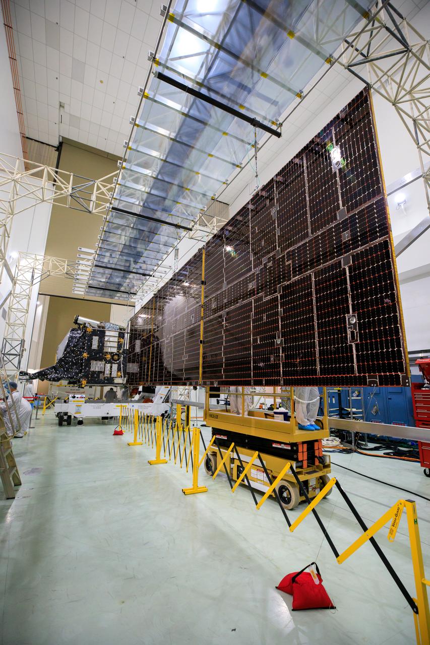 Technicians are preparing to integrate one of two solar arrays to NASA’s Psyche spacecraft inside the Astrotech Space Operations Facility near the agency’s Kennedy Space Center in Florida on July 24, 2023. The solar arrays were shipped from Maxar Technologies, in San Jose, California. They are part of the solar electric propulsion system, provided by Maxar, that will power the spacecraft on its journey to explore a metal-rich asteroid. Psyche will launch atop a SpaceX Falcon Heavy rocket from Launch Complex 39A at Kennedy. Launch is targeted for Oct. 5, 2023. Riding with Psyche is a pioneering technology demonstration, NASA’s Deep Space Optical Communications (DSOC) experiment.