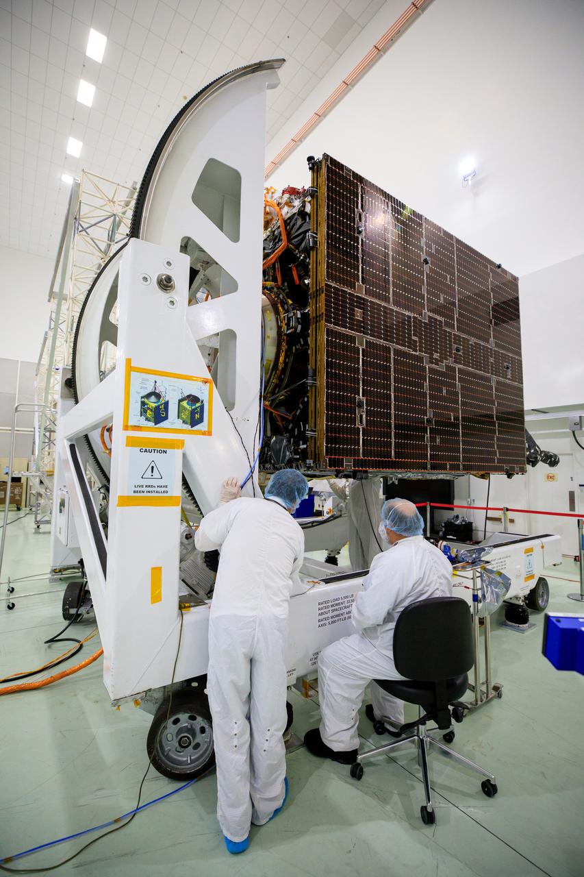 Team members prepare to integrate one of two solar arrays with NASA’s Psyche spacecraft inside the Astrotech Space Operations Facility near the agency’s Kennedy Space Center in Florida on July 24, 2023. The solar arrays were shipped from Maxar Technologies, in San Jose, California. They are part of the solar electric propulsion system, provided by Maxar, that will power the spacecraft on its journey to explore a metal-rich asteroid. Psyche will launch atop a SpaceX Falcon Heavy rocket from Launch Complex 39A at Kennedy. Launch is targeted for Oct. 5, 2023. Riding with Psyche is a pioneering technology demonstration, NASA’s Deep Space Optical Communications (DSOC) experiment. 
