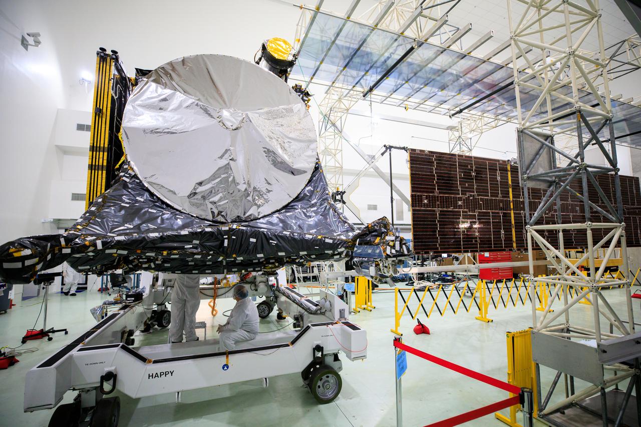 Team members prepare the agency’s Psyche spacecraft for integration with the second of two solar arrays inside the Astrotech Space Operations Facility near the agency’s Kennedy Space Center in Florida on July 24, 2023. The solar arrays were shipped from Maxar Technologies, in San Jose, California. They are part of the solar electric propulsion system, provided by Maxar, that will power the spacecraft on its journey to explore a metal-rich asteroid. Psyche will launch atop a SpaceX Falcon Heavy rocket from Launch Complex 39A at Kennedy. Launch is targeted for Oct. 5, 2023. Riding with Psyche is a pioneering technology demonstration, NASA’s Deep Space Optical Communications (DSOC) experiment. 