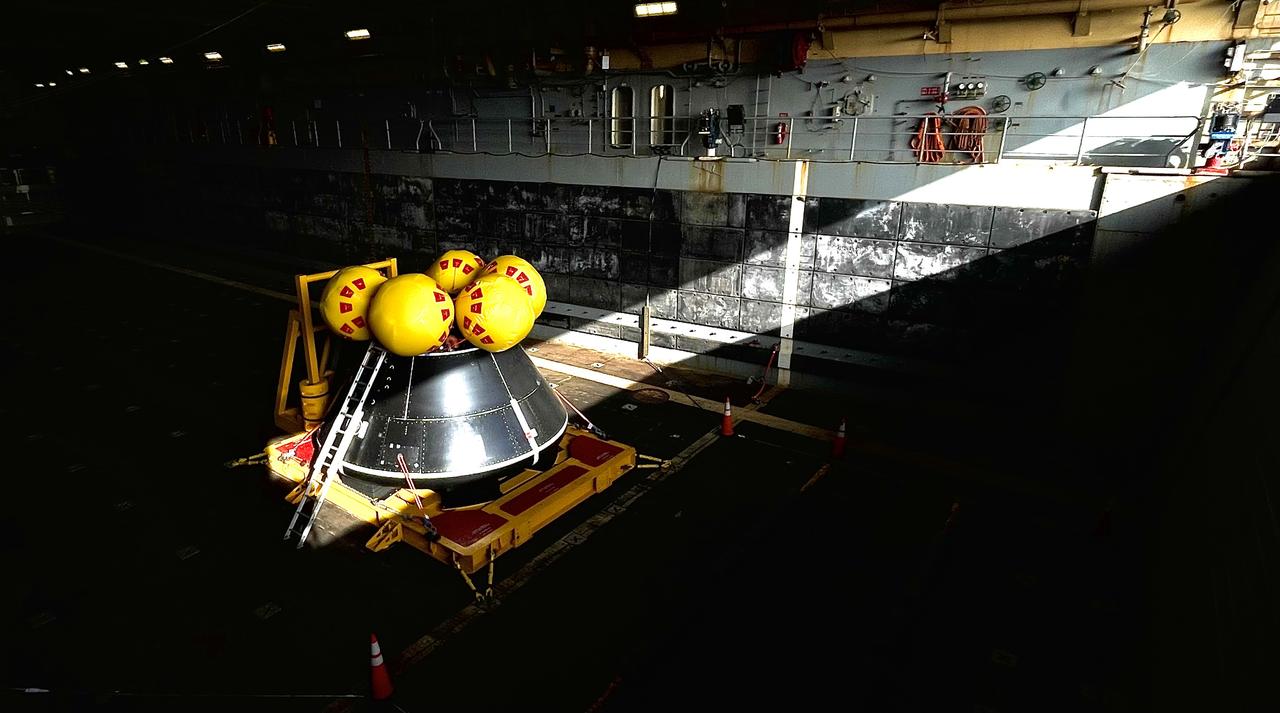 While onboard the USS John P. Murtha, NASA and the Department of Defense practice Artemis II recovery operations with the Crew Module Test Article (CMTA) in July of 2023. The CMTA is a full-scale mockup of the Orion spacecraft and is used to verify the recovery team is ready to support crew recovery after missions to the Moon.