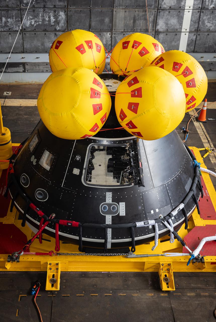While onboard the USS John P. Murtha, NASA and the Department of Defense practice Artemis II recovery operations with the Crew Module Test Article (CMTA) in July of 2023. The CMTA is a full-scale mockup of the Orion spacecraft and is used to verify the recovery team is ready to support crew recovery after missions to the Moon.