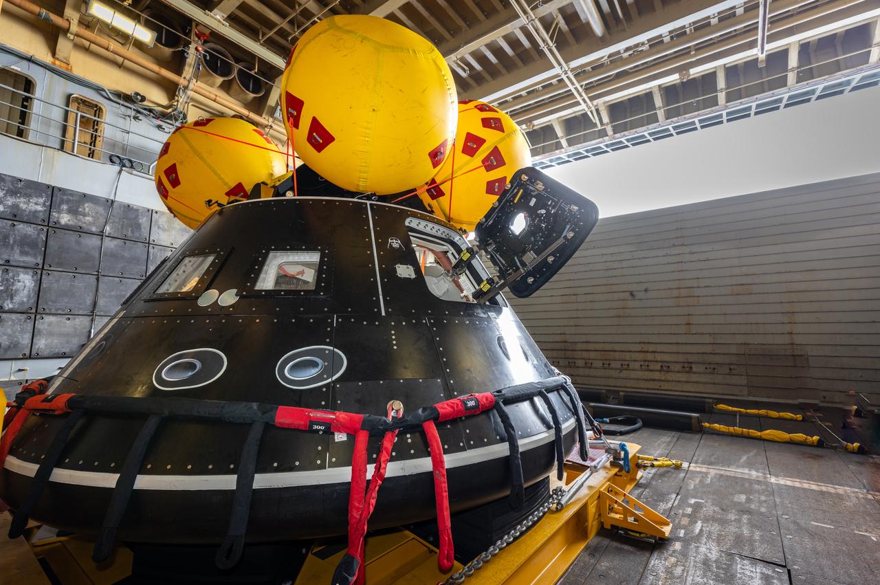 While onboard the USS John P. Murtha, NASA and the Department of Defense practice Artemis II recovery operations with the Crew Module Test Article (CMTA) in July of 2023. The CMTA is a full-scale mockup of the Orion spacecraft and is used to verify the recovery team is ready to support crew recovery after missions to the Moon.