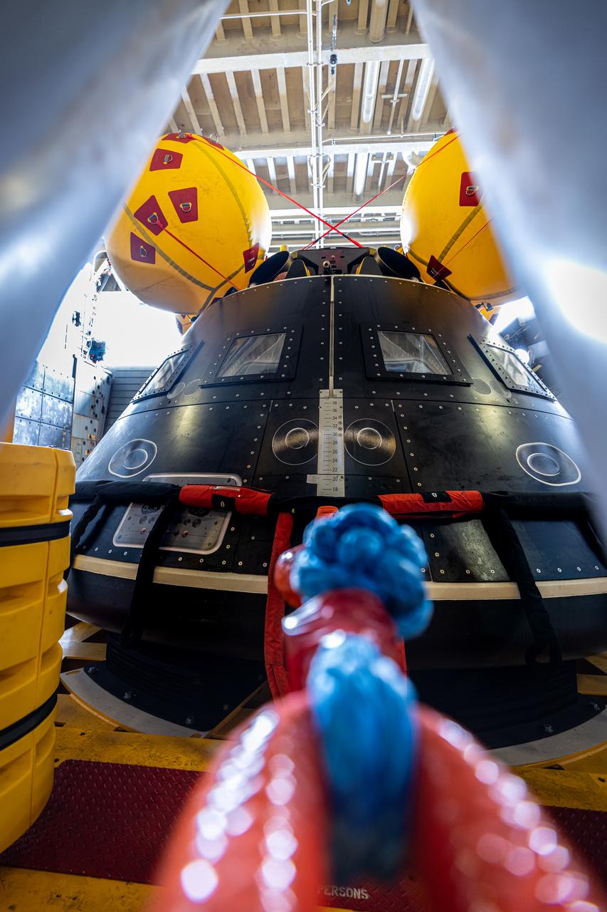 While onboard the USS John P. Murtha, NASA and the Department of Defense practice Artemis II recovery operations with the Crew Module Test Article (CMTA) in July of 2023. The CMTA is a full-scale mockup of the Orion spacecraft and is used to verify the recovery team is ready to support crew recovery after missions to the Moon.