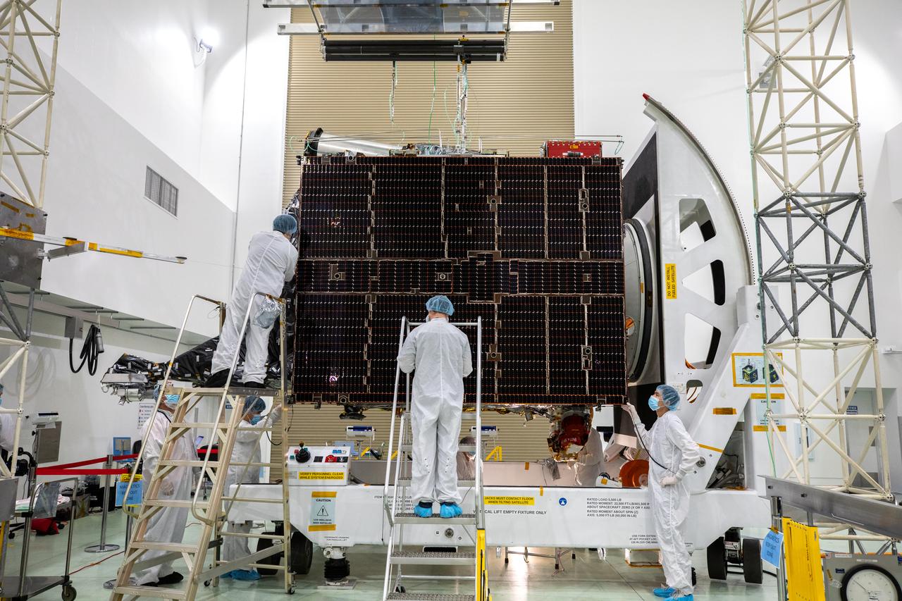 Team members have retracted the two solar arrays attached to NASA’s Psyche spacecraft inside the Astrotech Space Operations Facility near the agency’s Kennedy Space Center in Florida on July 25, 2023. The solar arrays, which were shipped from Maxar Technologies, in San Jose, California, are being stowed for launch. They are part of the solar electric propulsion system, provided by Maxar, that will power the spacecraft on its journey to explore a metal-rich asteroid. Psyche will launch atop a SpaceX Falcon Heavy rocket from Launch Complex 39A at Kennedy. Launch is targeted for Oct. 5, 2023. Riding with Psyche is a pioneering technology demonstration, NASA’s Deep Space Optical Communications (DSOC) experiment. 