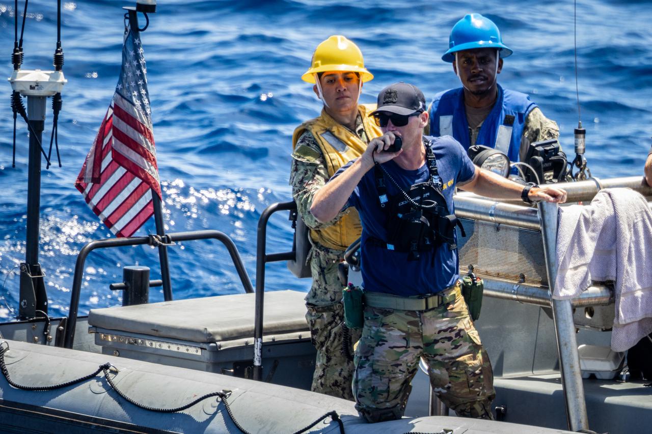 Navy divers from Explosive Ordnance Disposal (EOD) Expeditionary Support Unit 1 work to secure the Orion Crew Module Test Article (CMTA) in the Pacific Ocean as part of NASA’s Underway Recovery Test 10 (URT-10). The divers are trained in open water and small boat procedures and will be the team to help Artemis astronauts exit the Orion spacecraft and make it safely to the recovery ship after splashdown in addition to preparing the spacecraft to be transported back inside the recovery ship. 