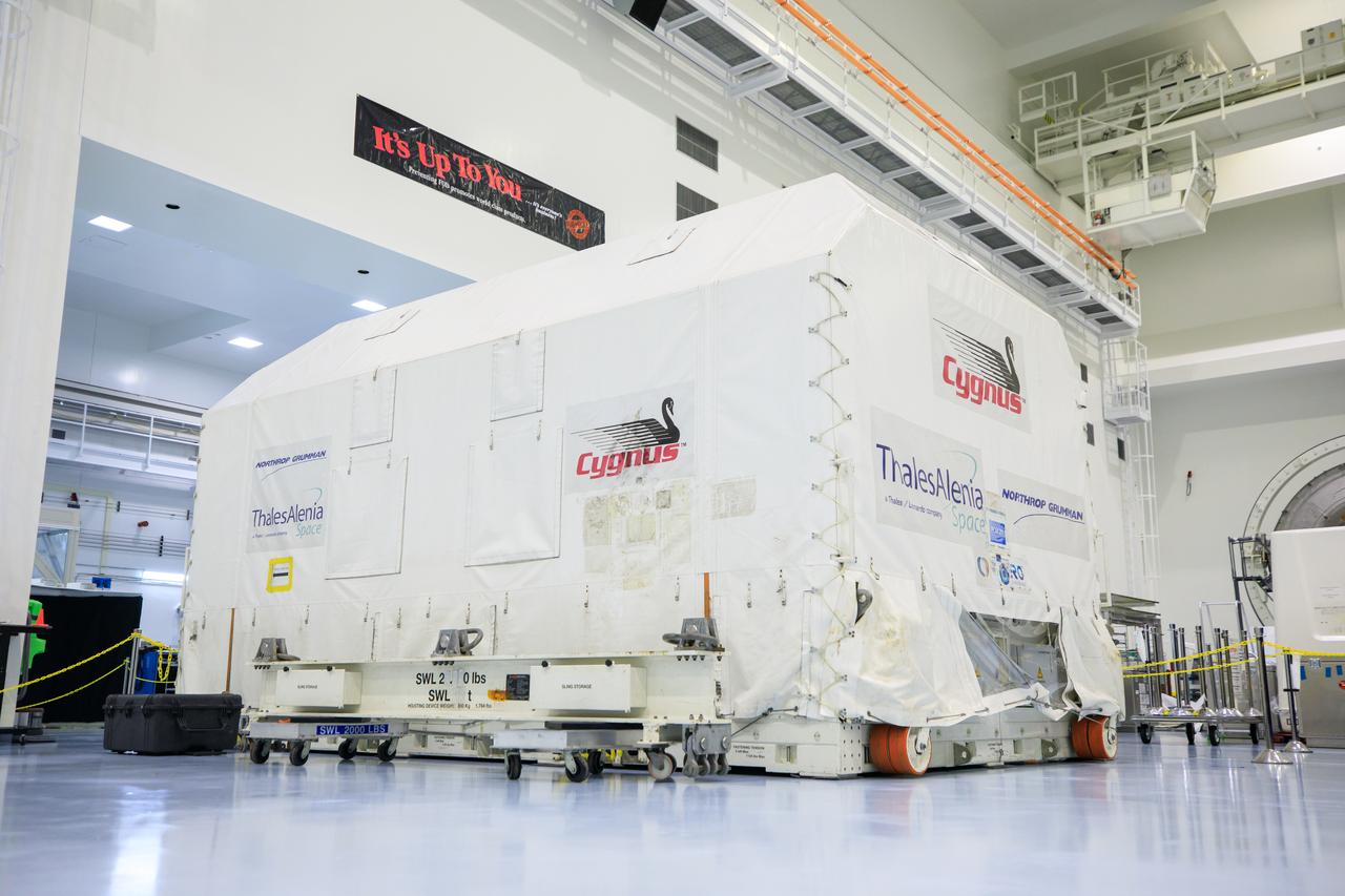 Northrop Grumman’s Cygnus pressurized cargo module for the company’s 20th commercial resupply mission arrives in its environmentally controlled shipping container inside the high bay in the Space Station Processing Facility at NASA's Kennedy Space Center in Florida on Aug. 2, 2023. Cygnus will launch later this year atop a SpaceX Falcon 9 rocket from Cape Canaveral Space Force Station’s Space Launch Complex 40 to the International Space Station. Cygnus will undergo prelaunch processing at Kennedy before it is transported to SpaceX’s integration facility.