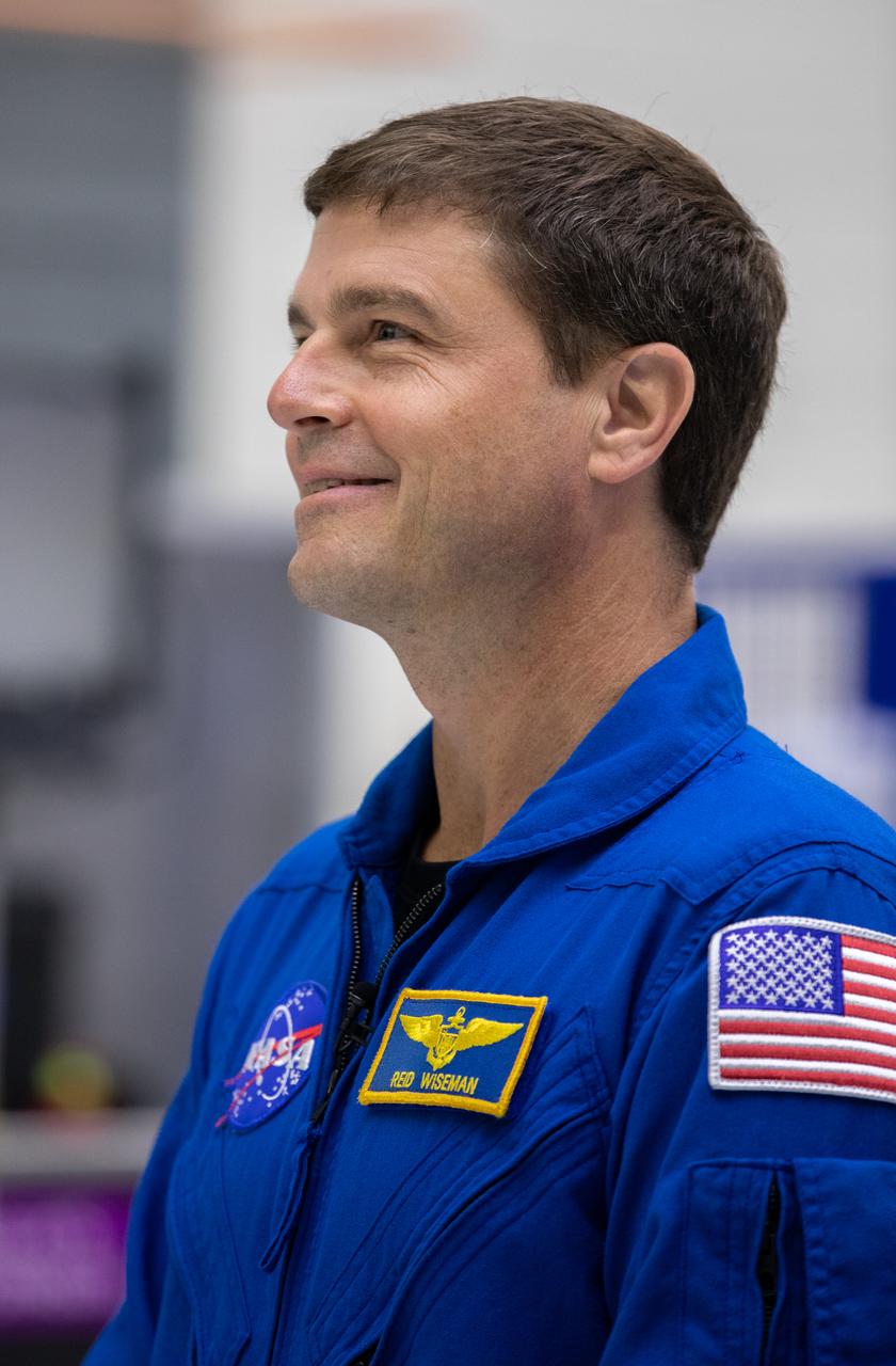 Artemis II mission commander Reid Wiseman smiles inside the Neil Armstrong Operations and Checkout Building at NASA’s Kennedy Space Center in Florida on Aug. 8, 2023. The Artemis II Orion crew module is undergoing acoustic testing ahead of integration with the European Service Module. Artemis II is the first crewed mission on NASA’s path to establishing a long-term lunar presence for science and exploration under Artemis.