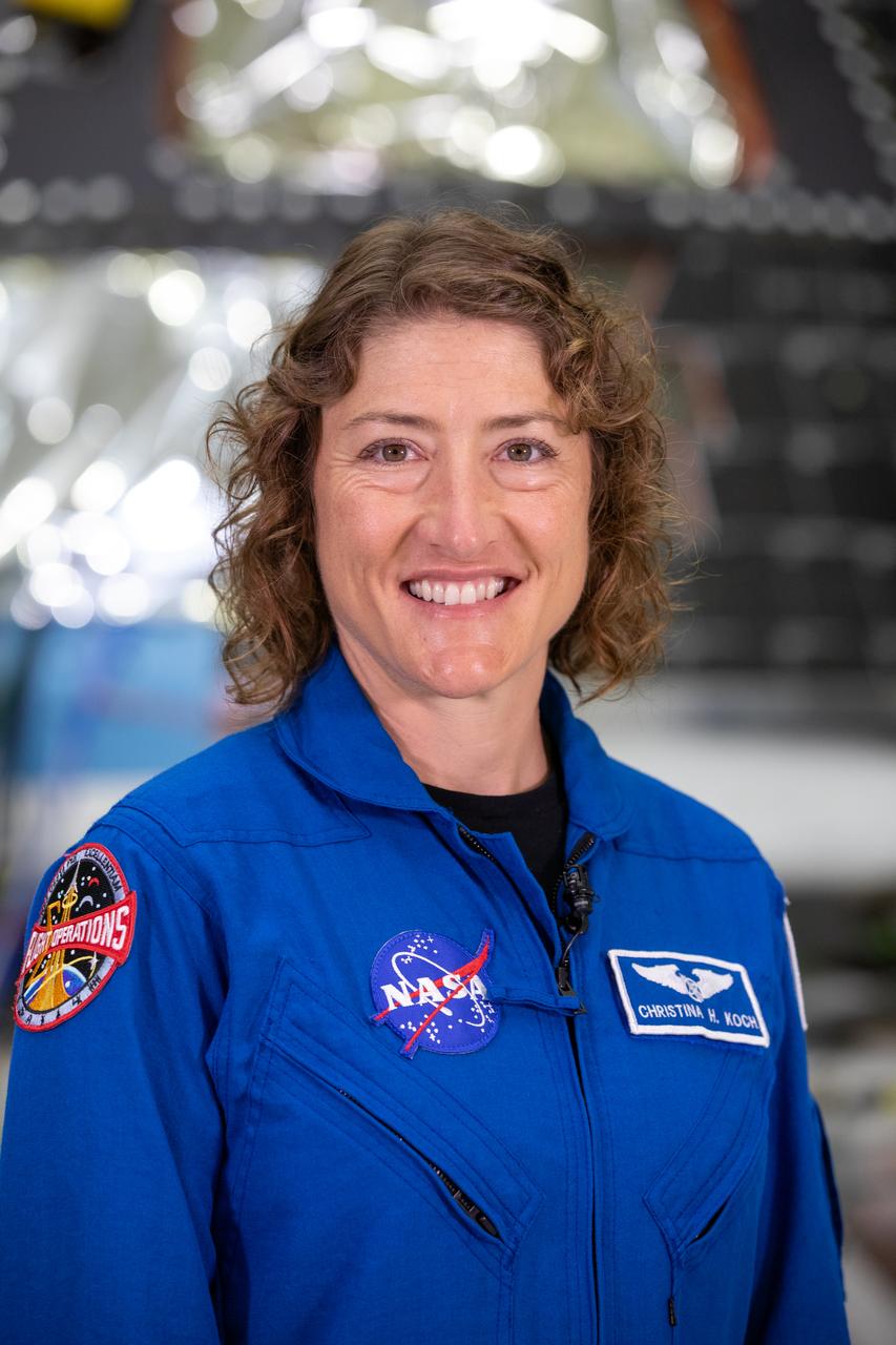 Artemis II mission specialist Christina Hammock Koch poses inside the Neil Armstrong Operations and Checkout Building at NASA’s Kennedy Space Center in Florida on Aug. 8, 2023. The Artemis II Orion crew module is undergoing acoustic testing ahead of integration with the European Service Module. Artemis II is the first crewed mission on NASA’s path to establishing a long-term lunar presence for science and exploration under Artemis.