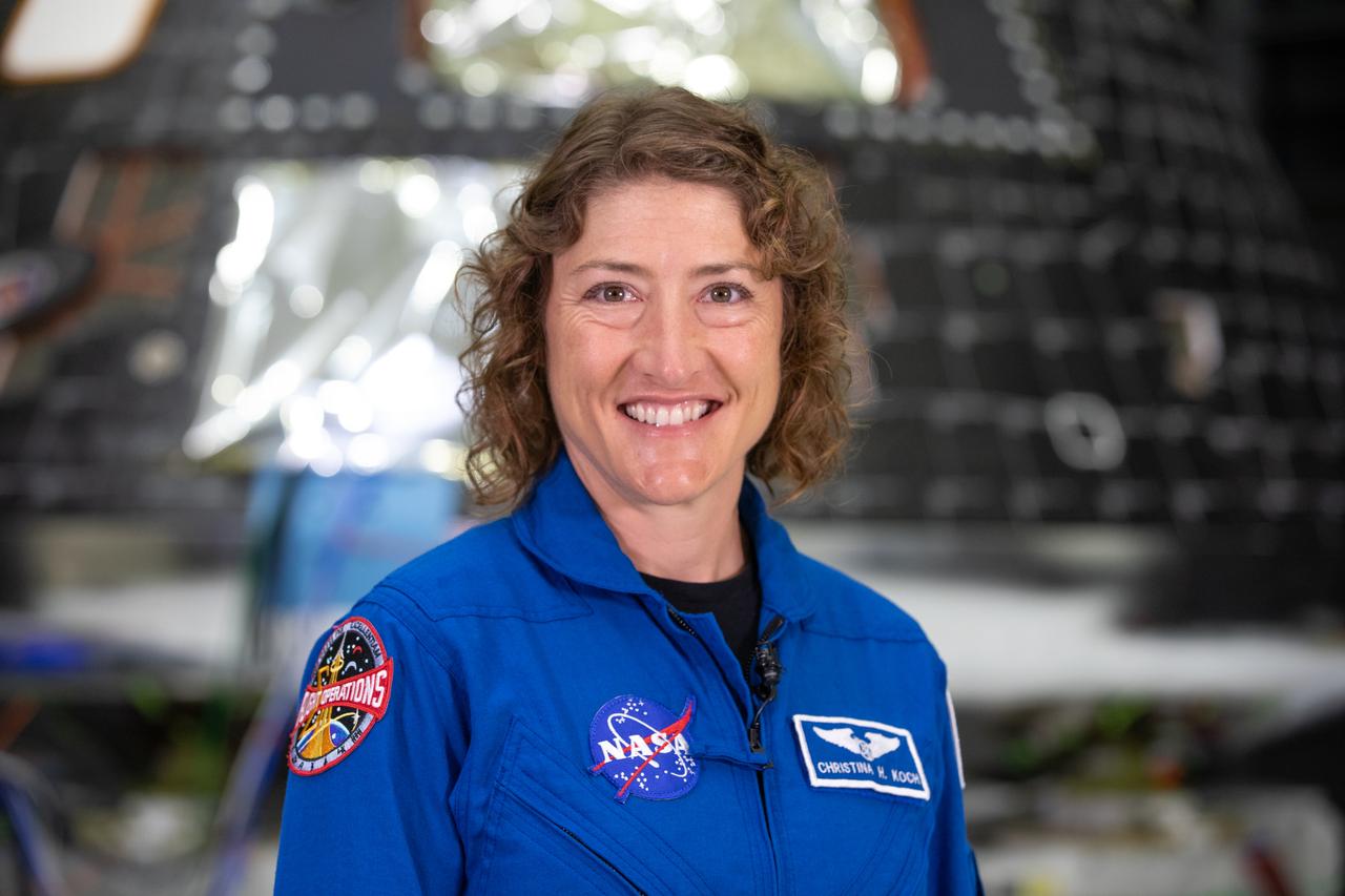 Artemis II mission specialist Christina Hammock Koch poses inside the Neil Armstrong Operations and Checkout Building at NASA’s Kennedy Space Center in Florida on Aug. 8, 2023. The Artemis II Orion crew module is undergoing acoustic testing ahead of integration with the European Service Module. Artemis II is the first crewed mission on NASA’s path to establishing a long-term lunar presence for science and exploration under Artemis.