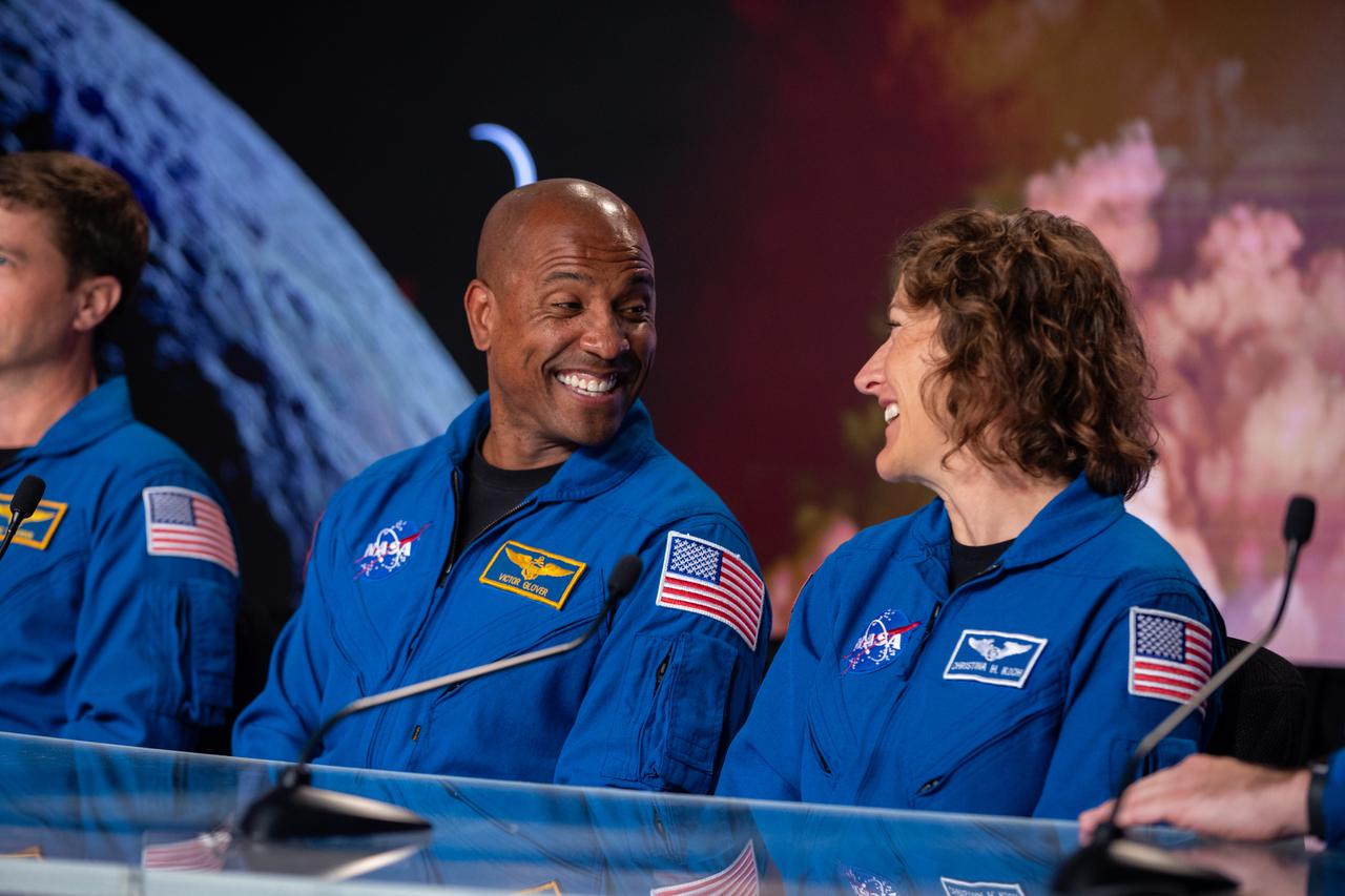 NASA astronauts Victor Glover, Artemis II pilot, and Christina Hammock Koch, Artemis II mission specialist, participate in a NASA news conference on Aug. 8, 2023, at the agency’s Kennedy Space Center in Florida. NASA senior leadership and the Artemis II crew discussed the mission – the first with astronauts under Artemis, which will send NASA astronauts Wiseman, Victor Glover, and Christina Koch, as well as Canadian Space Agency astronaut Jeremy Hansen around the Moon and back. Artemis II is the first crewed mission on NASA’s path to establishing a long-term lunar presence for science and exploration under Artemis and is the first mission with astronauts to the Moon.