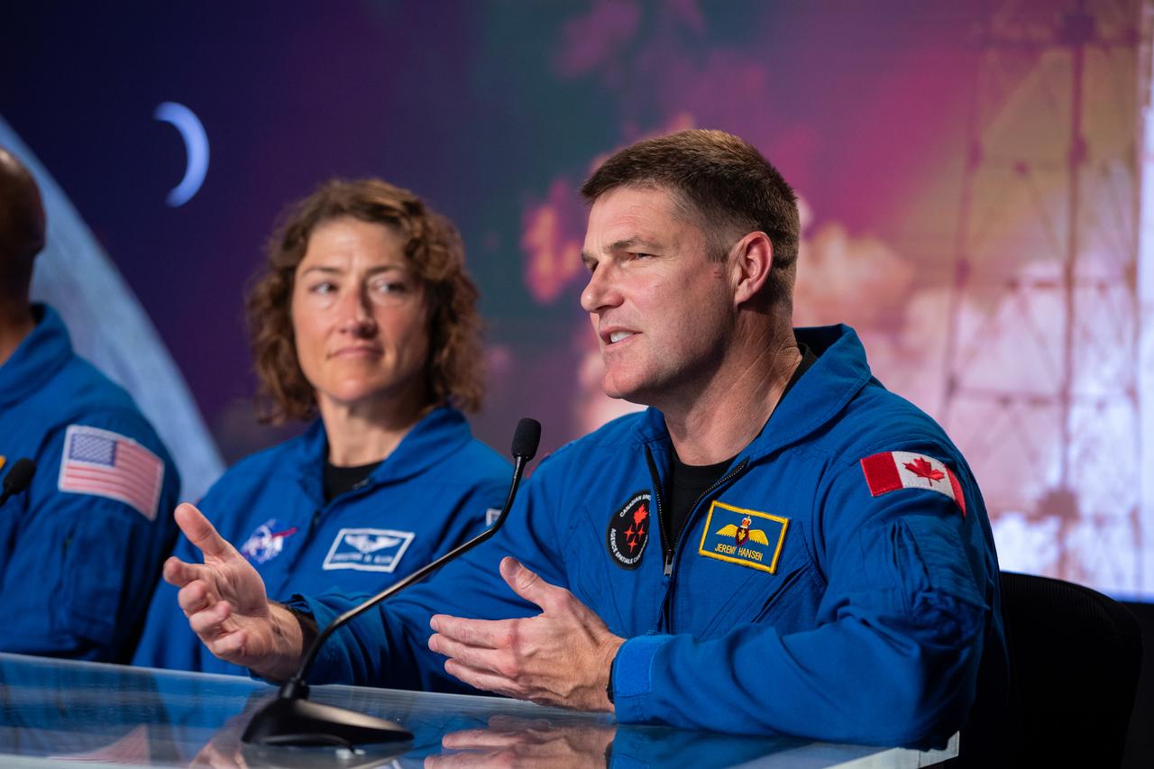 NASA astronaut Christina Hammock Koch, Artemis II mission specialist, and CSA (Canadian Space Agency) astronaut Jeremy Hansen, Artemis II mission specialist, participate in a NASA news conference on Aug. 8, 2023, at the agency’s Kennedy Space Center in Florida. NASA senior leadership and the Artemis II crew discussed the mission – the first with astronauts under Artemis, which will send NASA astronauts Wiseman, Victor Glover, and Christina Koch, as well as Canadian Space Agency astronaut Jeremy Hansen around the Moon and back. Artemis II is the first crewed mission on NASA’s path to establishing a long-term lunar presence for science and exploration under Artemis and is the first mission with astronauts to the Moon.