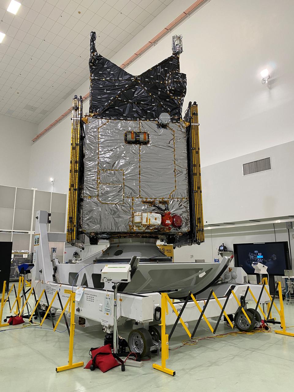 NASA’s Psyche spacecraft is made available to media for viewing inside a cleanroom at the Astrotech Space Operations Facility near Kennedy Space Center in Florida on Aug. 11, 2023. Psyche will launch atop a SpaceX Falcon Heavy rocket from Launch Complex 39A at Kennedy to explore a metal-rich asteroid. Launch is targeted for Oct. 5, 2023. Riding with Psyche is a pioneering technology demonstration, NASA’s Deep Space Optical Communications (DSOC) experiment.