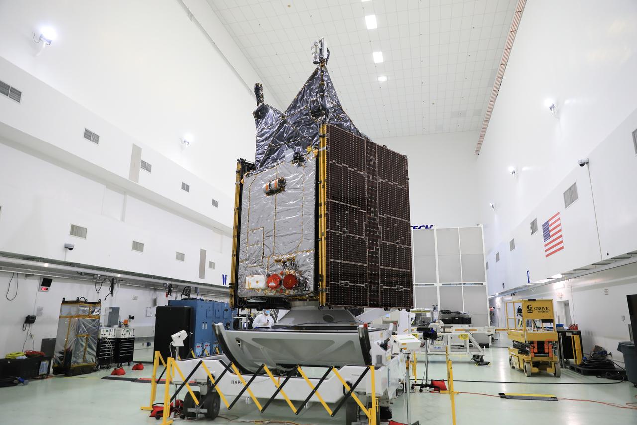 NASA’s Psyche spacecraft is made available to media for viewing inside a cleanroom at the Astrotech Space Operations Facility near Kennedy Space Center in Florida on Aug. 11, 2023. Psyche will launch atop a SpaceX Falcon Heavy rocket from Launch Complex 39A at Kennedy to explore a metal-rich asteroid. Launch is targeted for Oct. 5, 2023. Riding with Psyche is a pioneering technology demonstration, NASA’s Deep Space Optical Communications (DSOC) experiment.