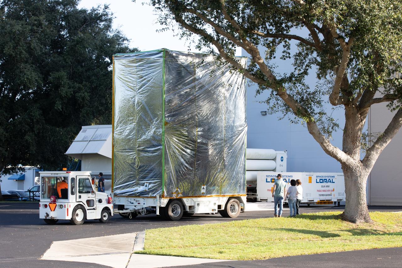 Technicians moved NASA’s Psyche spacecraft, secured for transport, to Building 9 at the Astrotech Space Operations Facility near the agency’s Kennedy Space Center in Florida on Aug. 14, 2023. Psyche will explore its namesake, a metal-rich asteroid orbiting the Sun between Mars and Jupiter. Psyche has NASA’s Deep Space Optical Communications (DSOC) technology demonstration onboard the spacecraft. DSOC will be the agency's first demonstration of optical communication beyond the Moon. Psyche will launch atop a SpaceX Falcon Heavy rocket from Launch Complex 39A at Kennedy. Launch is targeted for Oct. 5, 2023. 
