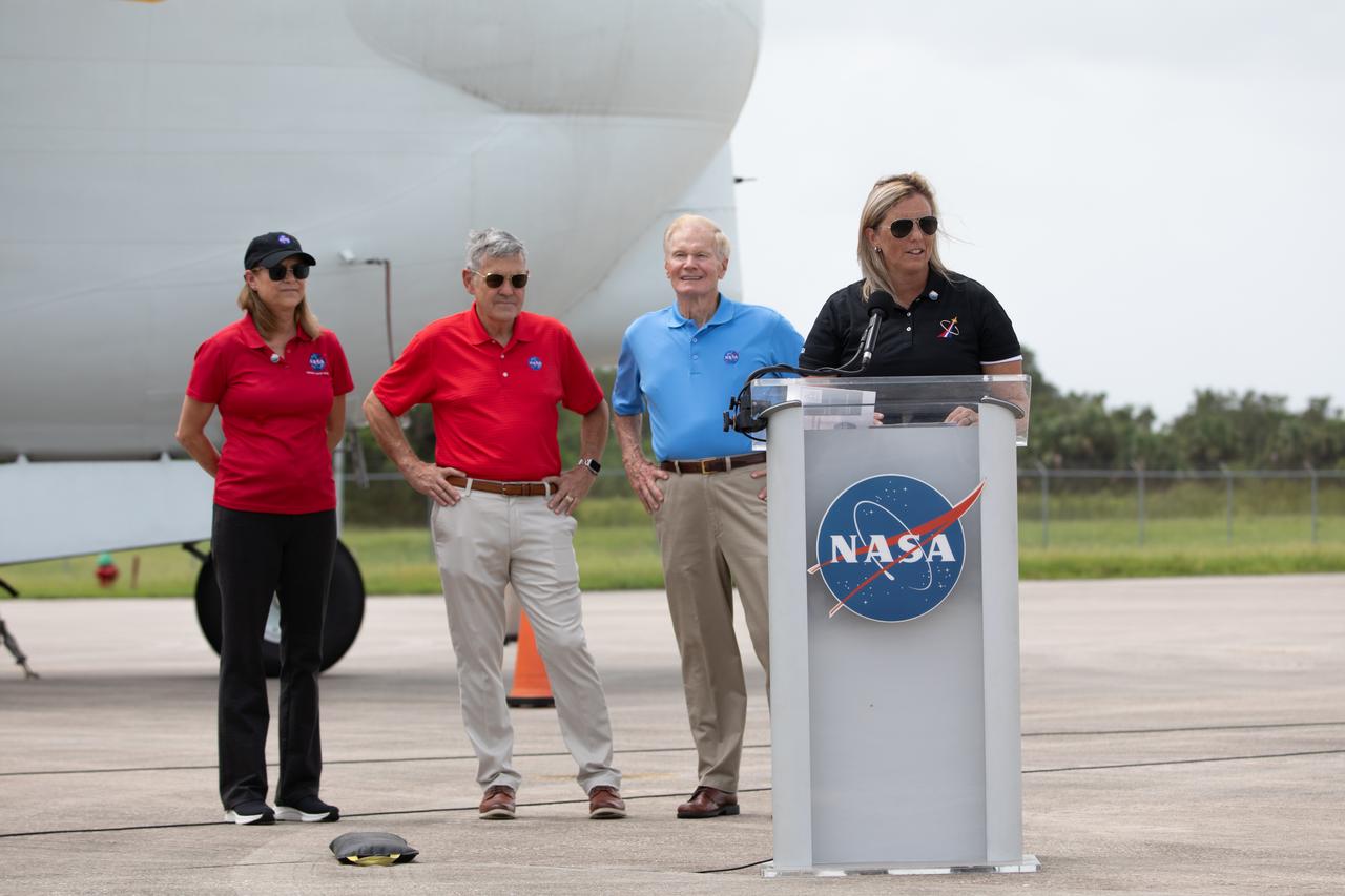Dana Hutcherson, deputy program manager, CCP, speaks to members of the news media during crew arrival for NASA’s SpaceX Crew-7 mission at the Launch and Landing Facility at Kennedy Space Center in Florida on Sunday, Aug. 20, 2023. In the background, from left, are: Janet Petro, director, NASA Kennedy; Bob Cabana, associate administrator, NASA; and Bill Nelson, administrator, NASA. Crew-7 will launch to the International Space Station aboard SpaceX’s Dragon spacecraft on the company’s Falcon 9 rocket. Liftoff is targeted for 3:49 a.m. EDT Friday, Aug. 25, 2023, from Kennedy’s Launch Complex 39A.