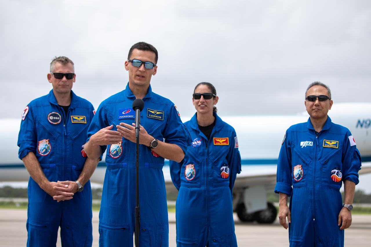 Roscosmos cosmonaut Konstantin Borisov addresses members of the news media during NASA’s SpaceX Crew-7 crew arrival event at the Launch and Landing Facility at Kennedy Space Center in Florida on Sunday, Aug. 20, 2023. In the background, from left, are ESA (European Space Agency) astronaut Andreas Mogensen, NASA astronaut Jasmin Moghbeli, and JAXA (Japan Aerospace Exploration Agency) astronaut Satoshi Furukawa. Liftoff is targeted for 3:49 a.m. EDT Friday, Aug. 25, 2023, from Kennedy’s Launch Complex 39A.