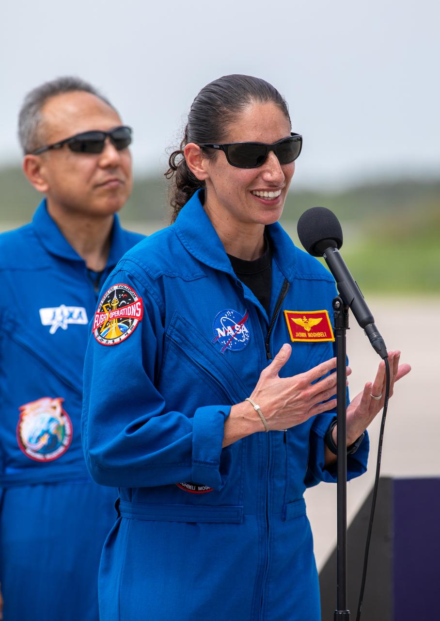 NASA astronaut Jasmin Moghbeli addresses members of the news media during NASA’s SpaceX Crew-7 crew arrival event at the Launch and Landing Facility at Kennedy Space Center in Florida on Sunday, Aug. 20, 2023. In the background is JAXA (Japan Aerospace Exploration Agency) astronaut Satoshi Furukawa. Liftoff for the Crew-7 mission is targeted for 3:49 a.m. EDT Friday, Aug. 25, 2023, from Kennedy’s Launch Complex 39A.