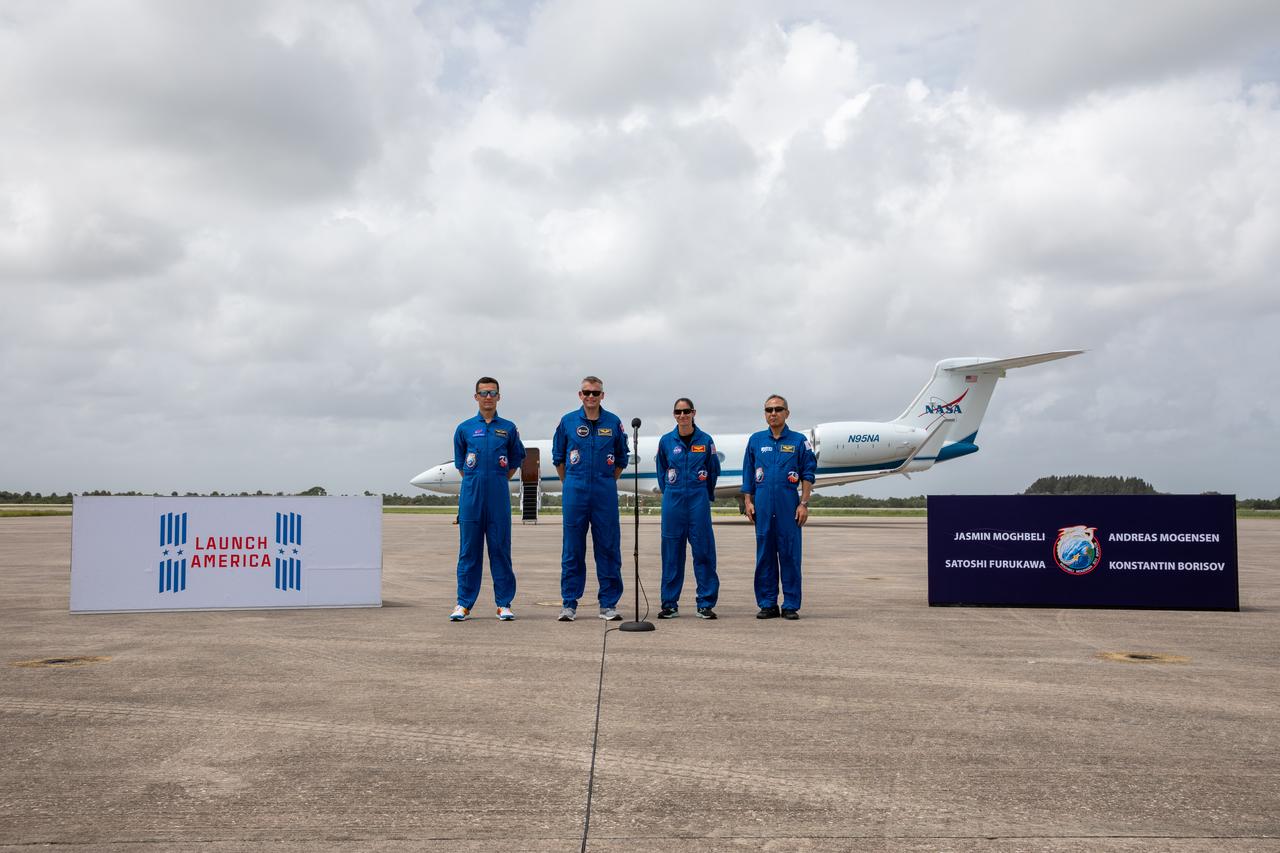 Crew members for NASA’s SpaceX Crew-7 mission to the International Space Station arrive at the Launch and Landing Facility at Kennedy Space Center in Florida on Sunday, Aug. 20, 2023. From left, Roscosmos cosmonaut Konstantin Borisov, ESA (European Space Agency) astronaut Andreas Mogensen, NASA astronaut Jasmin Moghbeli, and JAXA (Japan Aerospace Exploration Agency) astronaut Satoshi Furukawa stand before members of the news media. Liftoff of the Crew-7 mission is targeted for 3:49 a.m. EDT Friday, Aug. 25, 2023, from Kennedy’s Launch Complex 39A.