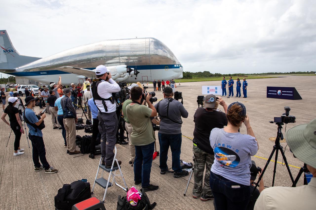 Crew members for NASA’s SpaceX Crew-7 mission to the International Space Station arrive at the Launch and Landing Facility at Kennedy Space Center in Florida on Sunday, Aug. 20, 2023. From left, Roscosmos cosmonaut Konstantin Borisov, ESA (European Space Agency) astronaut Andreas Mogensen, NASA astronaut Jasmin Moghbeli, and JAXA (Japan Aerospace Exploration Agency) astronaut Satoshi Furukawa stand before members of the news media. Liftoff of the Crew-7 mission is targeted for 3:49 a.m. EDT Friday, Aug. 25, 2023, from Kennedy’s Launch Complex 39A.